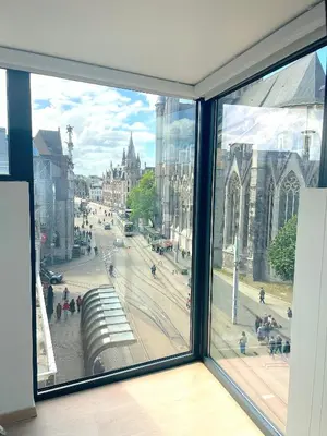 a view of a city street from a window at Duplex Apartment in the Heart of Ghent with Fantastic Views in Ghent