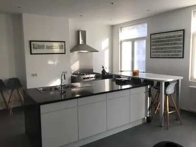 a kitchen with a sink and a counter top at New apartment in Brussels house in Brussels
