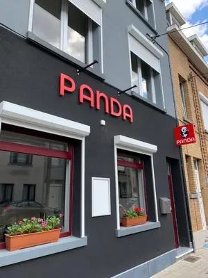 aapo sign on the side of a building with two windows at Panda Bella in Zaventem