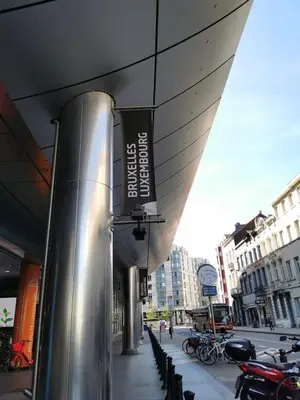 a building with a sign on the side of a street at Charming Europarlament Resedence in Brussels
