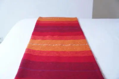 a close up of a colorful striped tie at Well-situated and Comfortable Home in Ghent