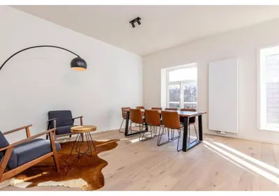 a dining room with a table and chairs at The Heart of Leuven in Leuven
