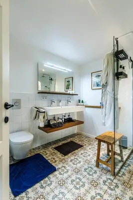 a bathroom with a toilet and a sink at B&B Hof Ter Koningen in Aalst