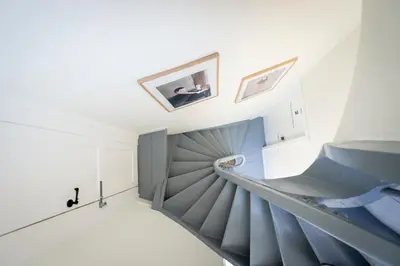 a staircase in a house with blue and white at SHWAY - The Suit in Antwerp