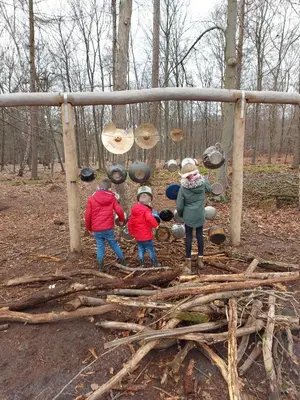 a group of children playing on a playground at B&B El Bayo in Ravels