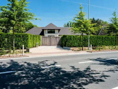 a house on the side of a road at B&B Welness Sport and Pleasure in Laarne
