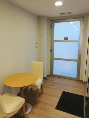 a room with a table and chairs and a large window at NUVOLA Summer Spring in Zottegem