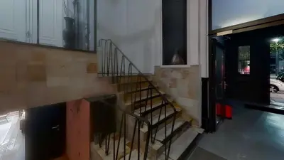a stairway in a building with a stair case at nice and cosy place with jacuzzi and sauna to relax in the centre of antwerp in Antwerp