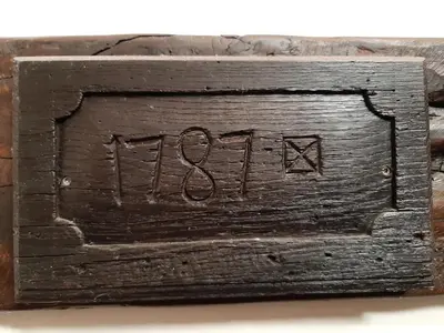 a wooden box with the word utopia written on it at Lemen huis Houwaart in Tielt