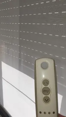 a remote control sitting on top of a table at Antwerp Hideaway, outside of low emission zone in Antwerp