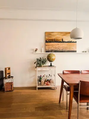 a dining room with a table and a tableablish at Appartement op top locatie in Antwerpen in Antwerp