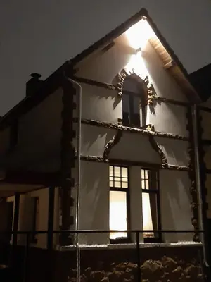 a building under construction with the light shining on it at Vélo 94 in Geel