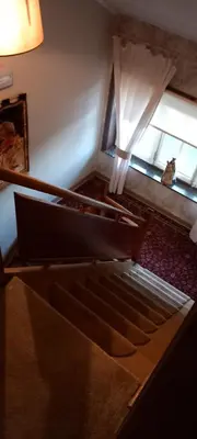 a bed in a room with a window at Wenceslas Cobergher Penthouse in Boutersem