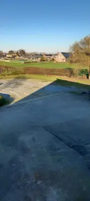 an empty parking lot with a golf course at Wenceslas Cobergher Penthouse in Boutersem