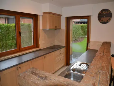 a kitchen with a sink and a counter top at Apartment in Antwerp near Verbeke Museum in Puivelde