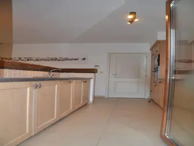 a kitchen with a sink and a counter top at Apartment in Antwerp near Verbeke Museum in Puivelde