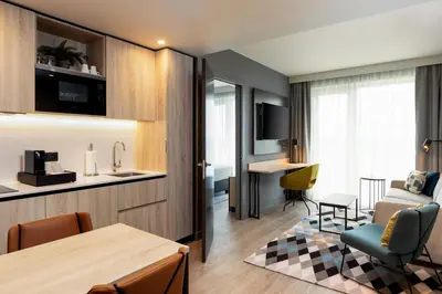 a room with a kitchen and a living room at Residence Inn by Marriott Brussels Airport in Diegem