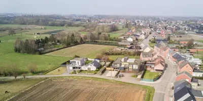 an aerial view of a residential neighborhood with houses at Hotel Essenza in Puurs