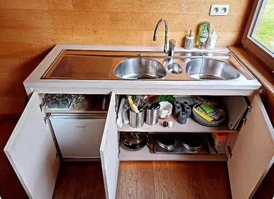 a kitchen with a sink and a sink at De linderd in Aalst