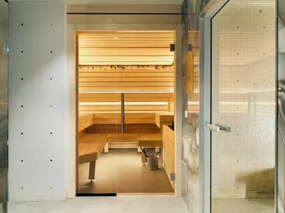 a sauna in a room with a glass door at Juliana Hotel & Spa - Brussels Centre in Brussels