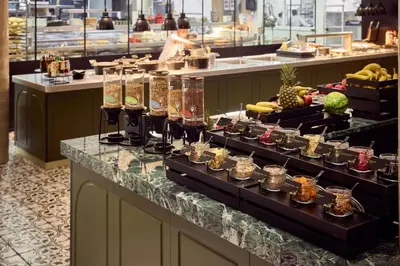 a buffet line with many different types of food at Van der Valk Hotel Gent in Ghent