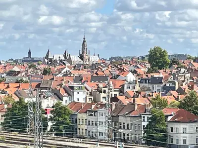 a view of a city with houses and buildings at - - - - - Au Sixième Ciel - - - - - in Brussels