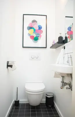 a bathroom with a toilet and a sink at R213 Residences Botanique in Brussels