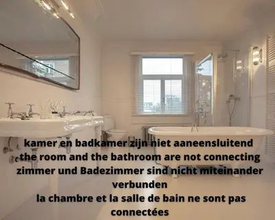 a bathroom with a sink and a mirror at ADA in Antwerp