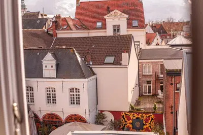 a view from a window of a city with buildings at Luxury Suites Boutique by Rikas Hotels in Antwerp