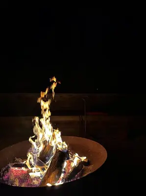 a fire in a pan with flames in it at Het Verblijf in Sint-Martens-Lennik