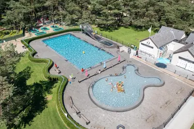 an overhead view of a large swimming pool at Recreatie- en Natuurpark Keiheuvel in Balen