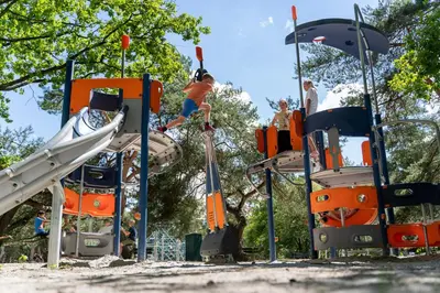 a group of people on a playground at Recreatie- en Natuurpark Keiheuvel in Balen