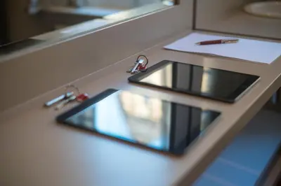 a bathroom sink with a pen on a counter at Garden of Eden in Antwerp
