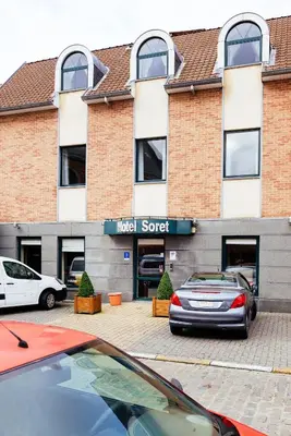 a car parked in front of a hotel spot at Hotel Soret in Overijse