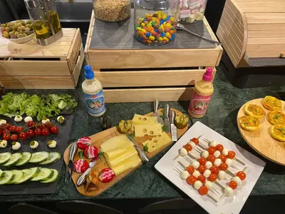 a table topped with lots of different types of food at La Bourse Hotel in Brussels