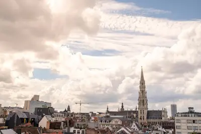 a view of a city with a cloudy sky at THE GOOD FLATS in Brussels