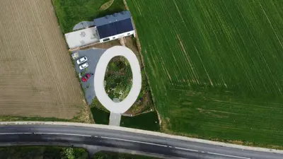 an aerial view of a field with a white circle at B&B Entre Champs in Ohain