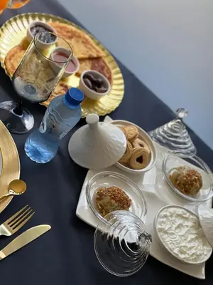 a table topped with food and a plate of food at Résidence Palace Expo in Brussels