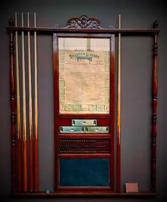 an old fashioned radio on a wall with a map at Mezonvin in Antwerp