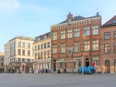 a group of buildings on a city street at Saint Paulus Square Apartments in Antwerp
