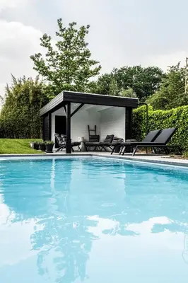 a house with a swimming pool and a pavilion at Guesthouse Max in Burcht