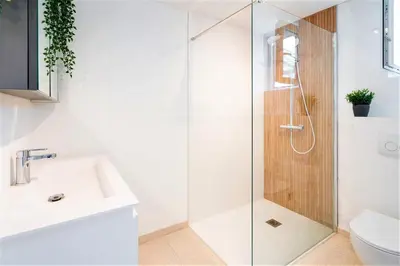 a bathroom with a shower and a sink at Saint Pauls Central Residence in Antwerp