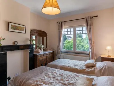 a bedroom with two beds and a window at Villa Jasmine by Interhome in Mol