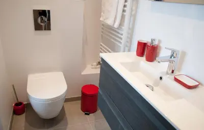 a bathroom with a white sink and a toilet at Wellintown Guest House in Waterloo