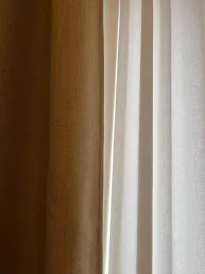 a close up of a white curtain at De Flat - Licht en luxueus appartement bij Het Zuid in Antwerp
