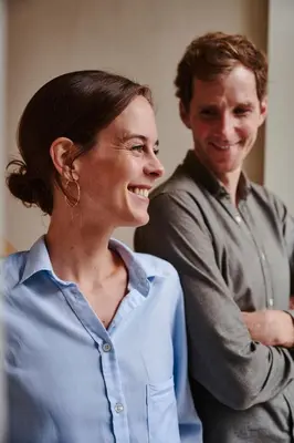 a man and a woman standing next to each other at Edgar Guesthouse in Ghent