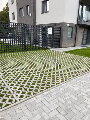 a brick driveway in front of a building at BEUKENHOUSE in Drogenbos