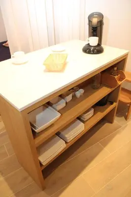 a table with a coffee maker on top of it at STUDIO61 in Ghent