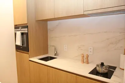 a kitchen with a sink and a counter top at STUDIO61 in Ghent