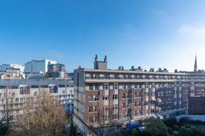 a view of the city from a building at Royal Design Residence in Brussels